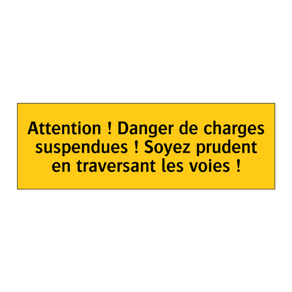 Attention ! Danger de charges suspendues ! Soyez prudent en traversant les voies !