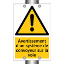 Avertissement d'un système de convoyeur sur la voie