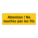 Attention ! Ne touchez pas les fils