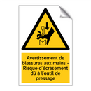 Avertissement de blessures aux mains - Risque d'écrasement dû à l'outil de pressage