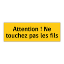 Attention ! Ne touchez pas les fils