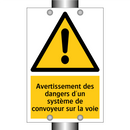 Avertissement des dangers d'un système de convoyeur sur la voie