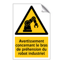 Avertissement concernant le bras de préhension du robot industriel