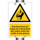 Avertissement du risque de coincement des mains entre les outils d'une presse