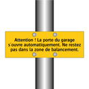Attention ! La porte du garage s'ouvre automatiquement. Ne restez pas dans la zone de balancement