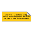 Attention ! La porte du garage s'ouvre automatiquement. Ne restez pas dans la zone de balancement