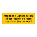 Attention ! Danger de gaz ! Il est interdit de rester sous la scène du four !