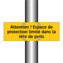 Attention ! Espace de protection limité dans la tête de puits