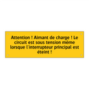 Attention ! Aimant de charge ! Le circuit est sous tension même lorsque l'interrupteur principal est éteint !