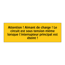 Attention ! Aimant de charge ! Le circuit est sous tension même lorsque l'interrupteur principal est éteint !