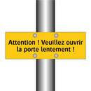 Attention ! Veuillez ouvrir la porte lentement !