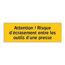 Attention ! Risque d'écrasement entre les outils d'une presse
