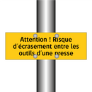 Attention ! Risque d'écrasement entre les outils d'une presse