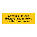 Attention ! Risque d'écrasement entre les outils d'une presse