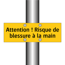 Attention ! Risque de blessure à la main