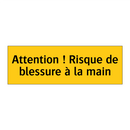 Attention ! Risque de blessure à la main