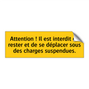 Attention ! Il est interdit de rester et de se déplacer sous des charges suspendues