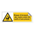 Risque d'écrasement des mains entre les outils d'une presse !