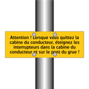 Attention ! Lorsque vous quittez la cabine du conducteur, éteignez les interrupteurs dans la cabine du conducteur et sur le pont du grue !