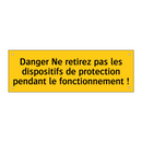 Danger Ne retirez pas les dispositifs de protection pendant le fonctionnement !