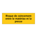 Risque de coincement entre le matériau et la presse