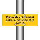 Risque de coincement entre le matériau et la presse