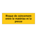 Risque de coincement entre le matériau et la presse