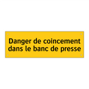 Danger de coincement dans le banc de presse