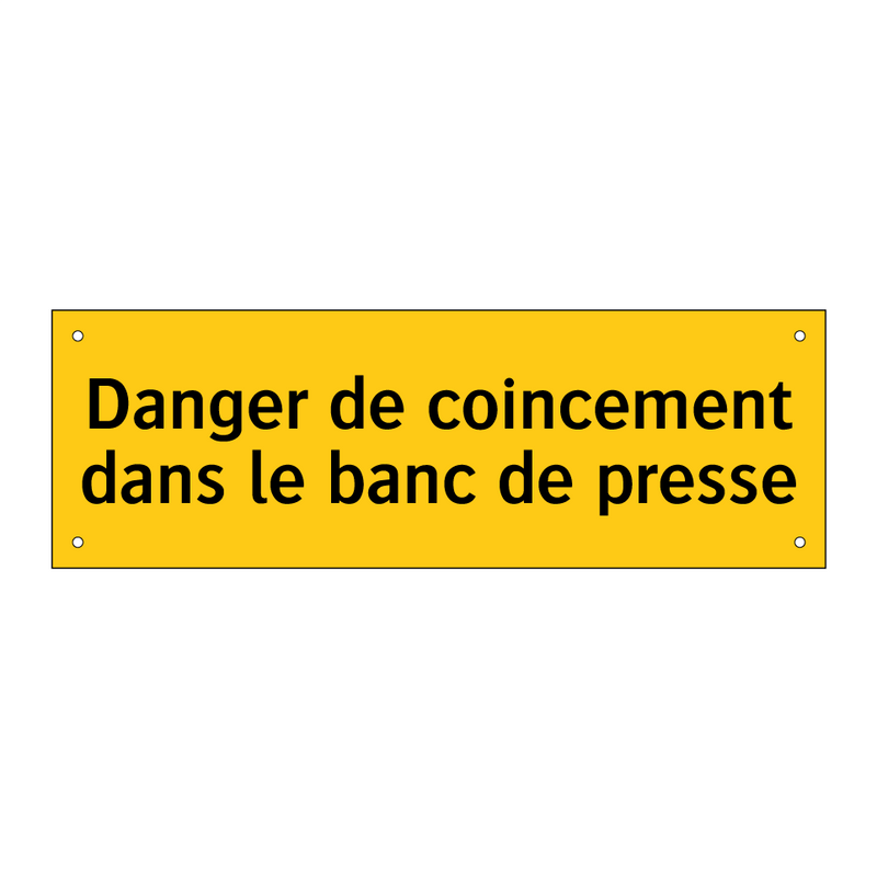 Danger de coincement dans le banc de presse