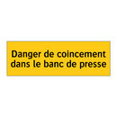 Danger de coincement dans le banc de presse