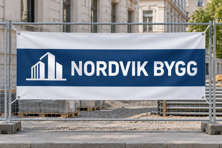 PVC banner with company name on construction fencing
